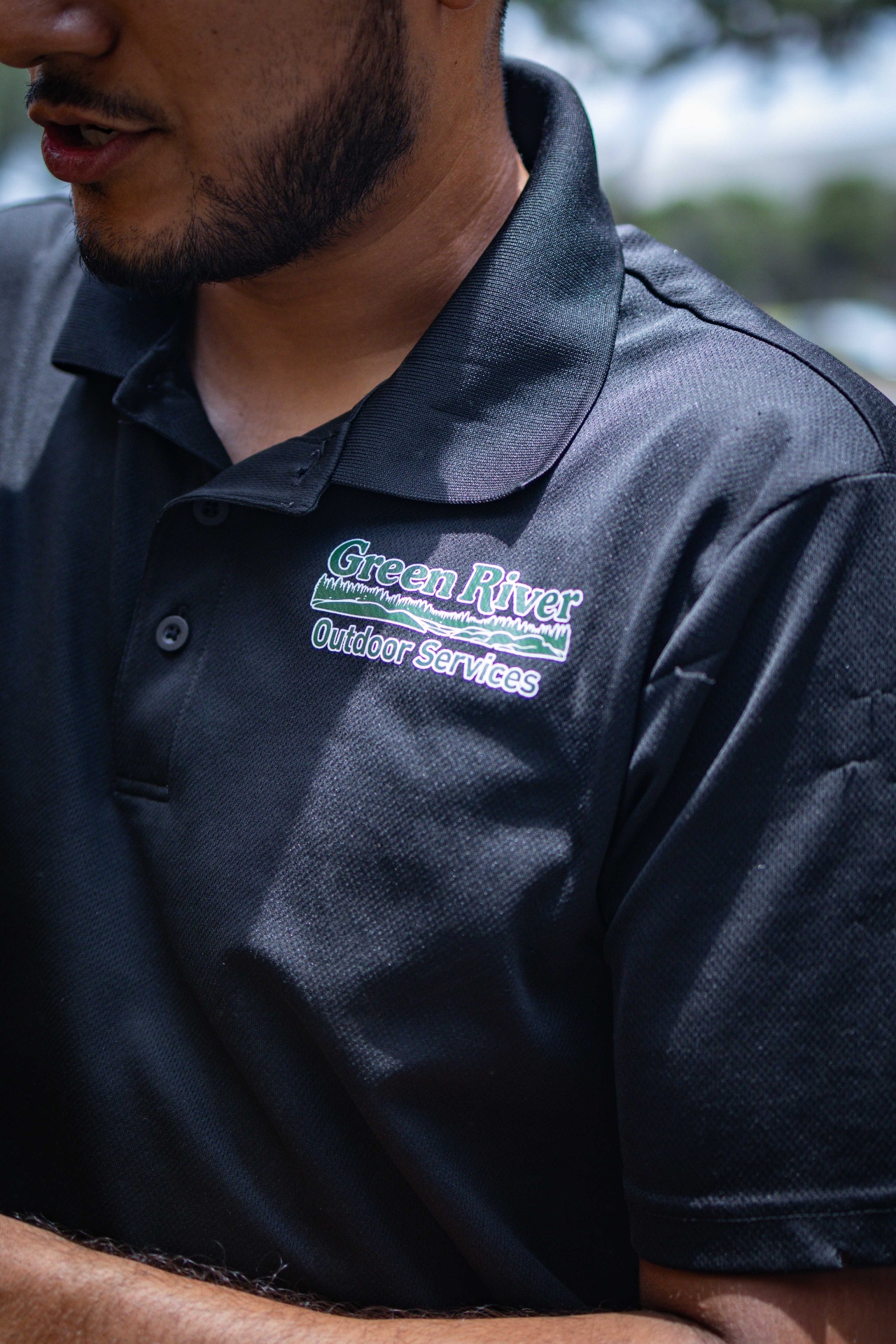 Green River team member in branded polo